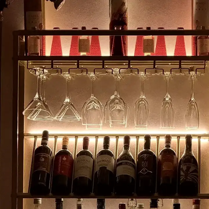 The lobby bar at the Lilium: backlit bottles and glasses